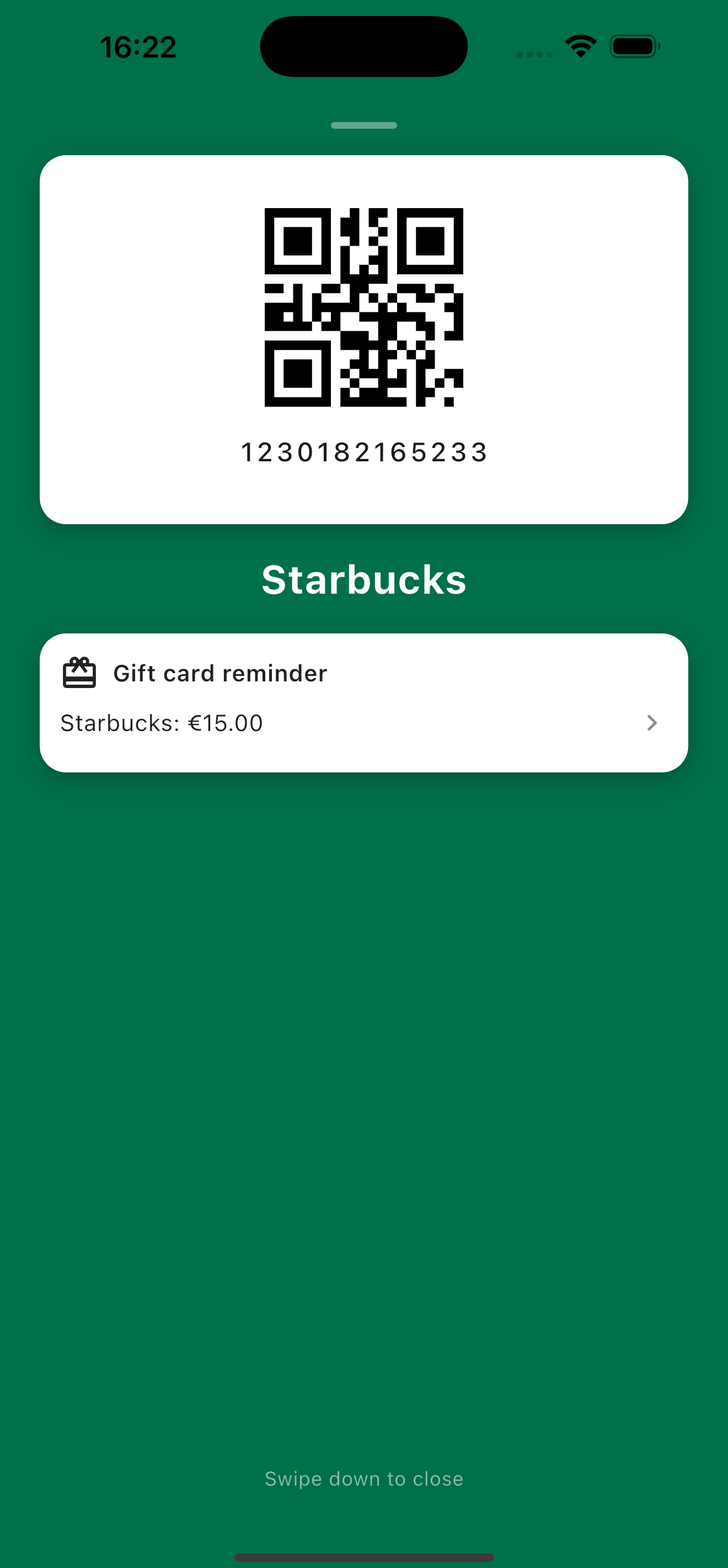 Starbucks loyalty card open at the register, with a gift card reminder showing a €15 balance