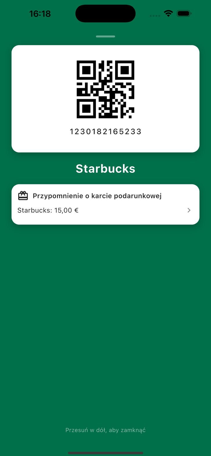 Otwarta przy kasie karta lojalnościowa Starbucks z przypomnieniem o karcie podarunkowej z saldem 15 €